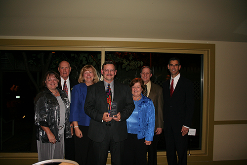 (from left to right) Melinda Maddox, Lan Neugent, Carla Wade, Wayne Hartschuh (2012 Winner), Jayne Moore, Rick Gaisford, and Michael Golden
